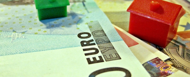 Euro currency and houses.